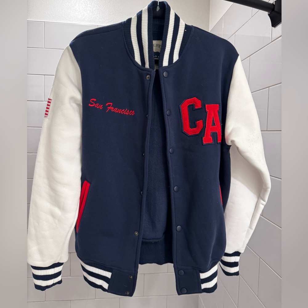 Brand is California City Wear. Medium size. Condition is used.
